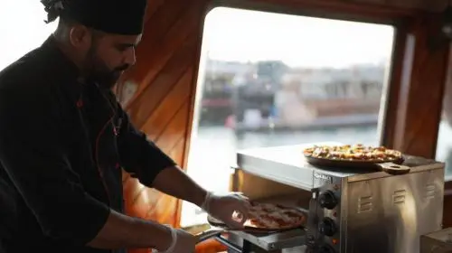 Marina Sightseeing Cruise with Transfer and  Optional Unlimited Pizza Meal Day Tours in Dubai