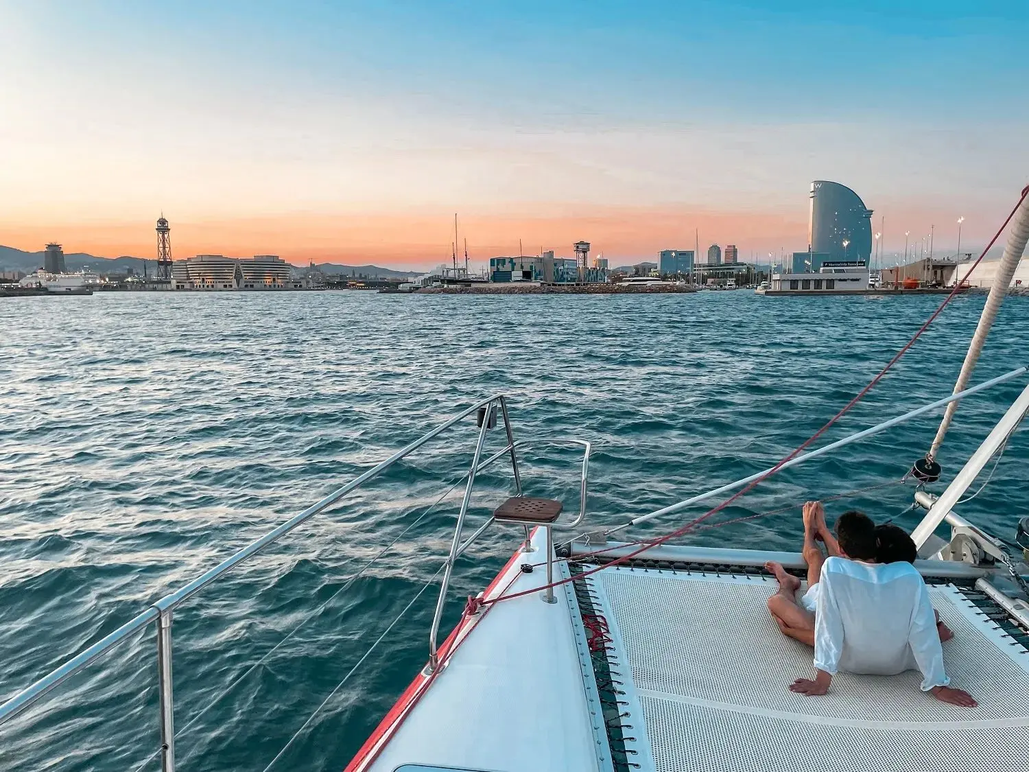 Exclusive Catamaran Cruise with Tapa & Drink Included in Barcelona