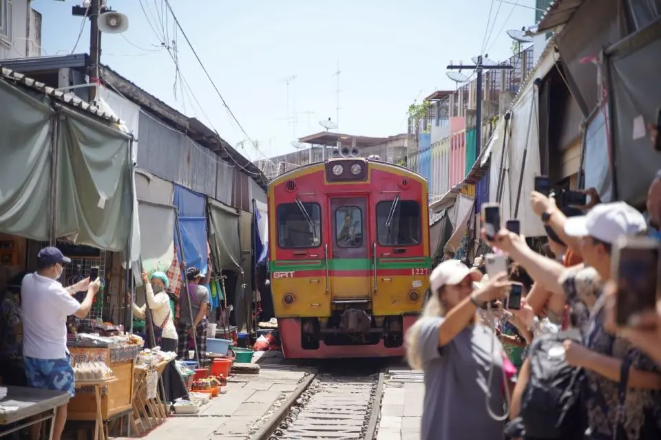 Classic Bangkok tour - Railway Train market & Damnoen Saduak Floating market in Bangkok